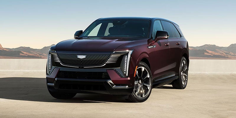 Cadillac Escalade-IQ Vehicle Parked In Front Of The Hills